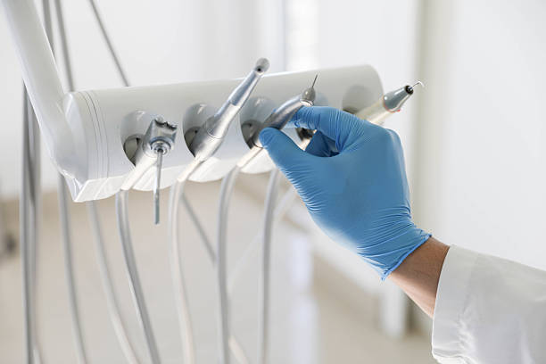 Professional Dental Crowns And Bridges technician working in Village of the Branch, NY
